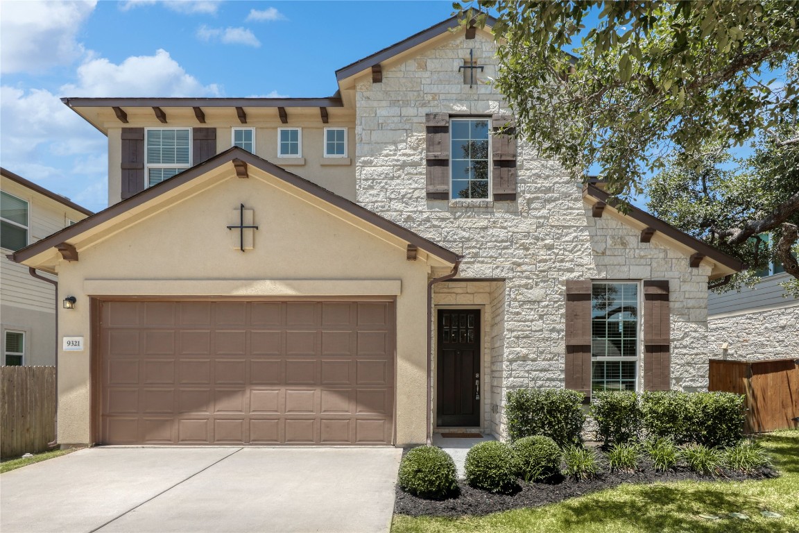 9321 Kyles Stake Road Austin, TX 78717 - Photo 1 of 1 a front view of a house with garage