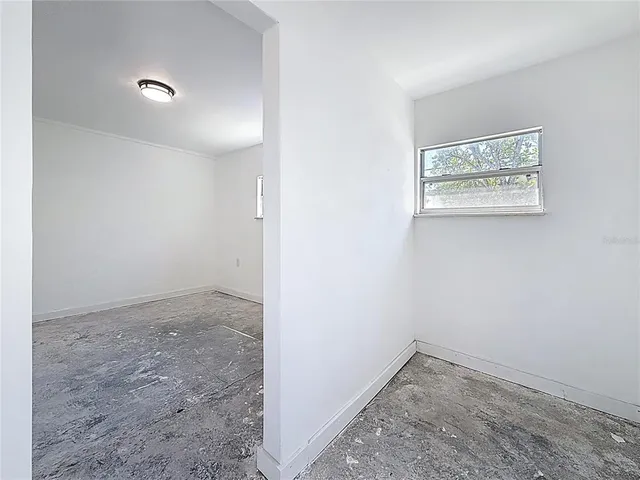 an empty room with a window
