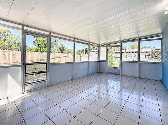 a view of a room and window