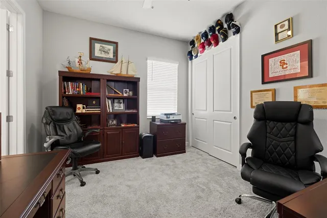 a en suite bathroom with a double vanity sink and a mirror