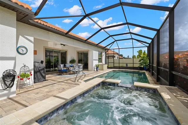 a view of a swimming pool and outdoor space