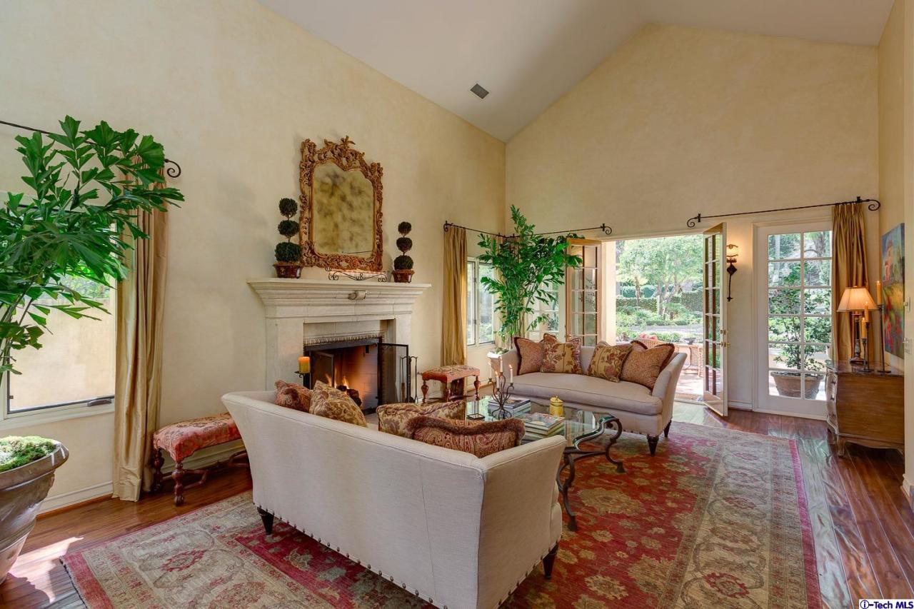 Undisclosed Address Pasadena, CA 91103 - Photo 14 of 80 a living room with furniture large window and fireplace