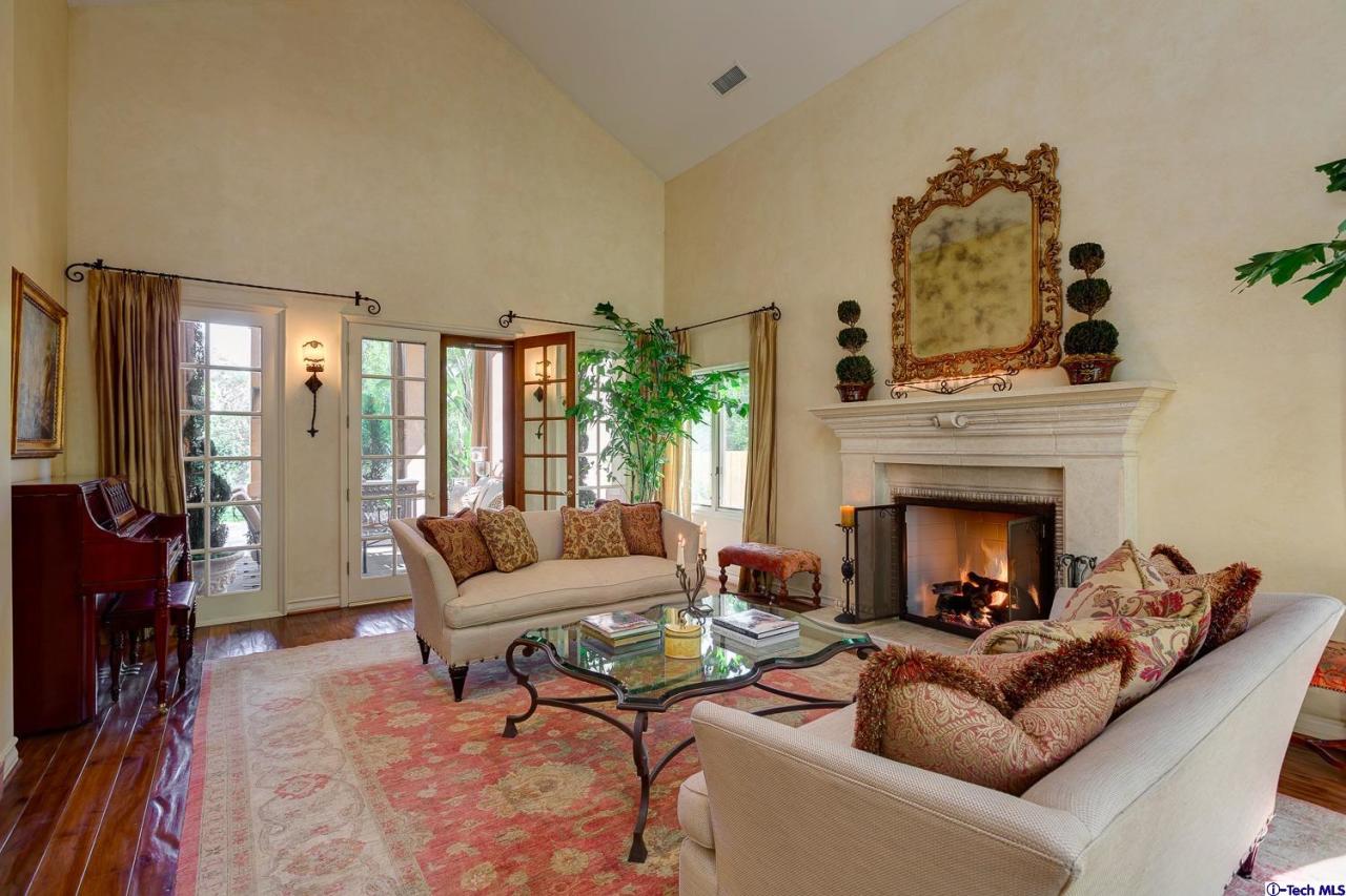 Undisclosed Address Pasadena, CA 91103 - Photo 15 of 80 a living room with furniture and a fireplace