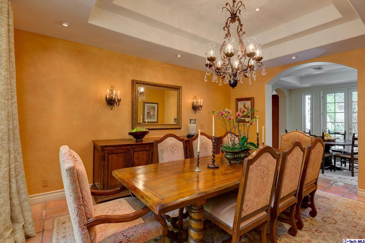 Undisclosed Address Pasadena, CA 91103 - Photo 22 of 80 a view of a dining room with furniture and a chandelier
