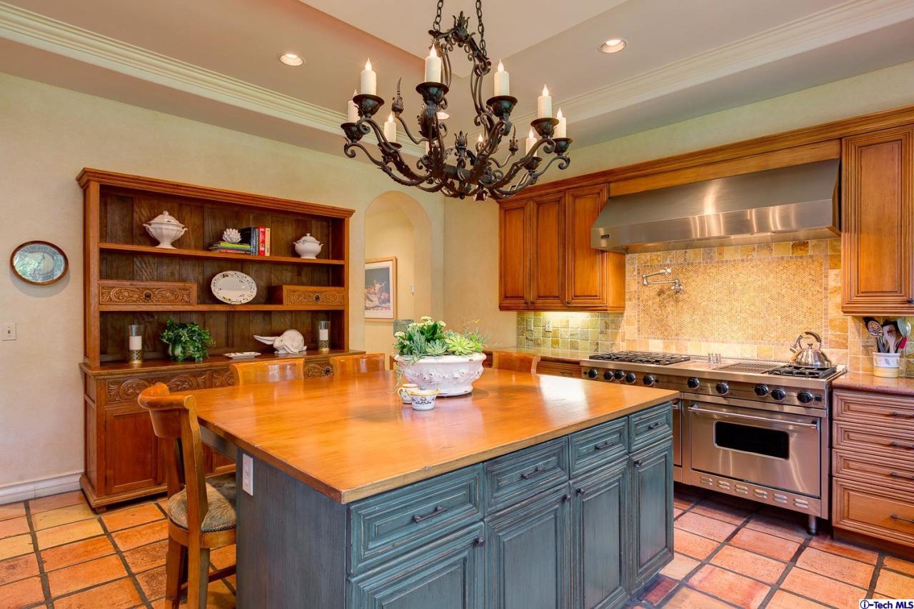 Undisclosed Address Pasadena, CA 91103 - Photo 27 of 80 a kitchen with a counter space a sink and cabinets