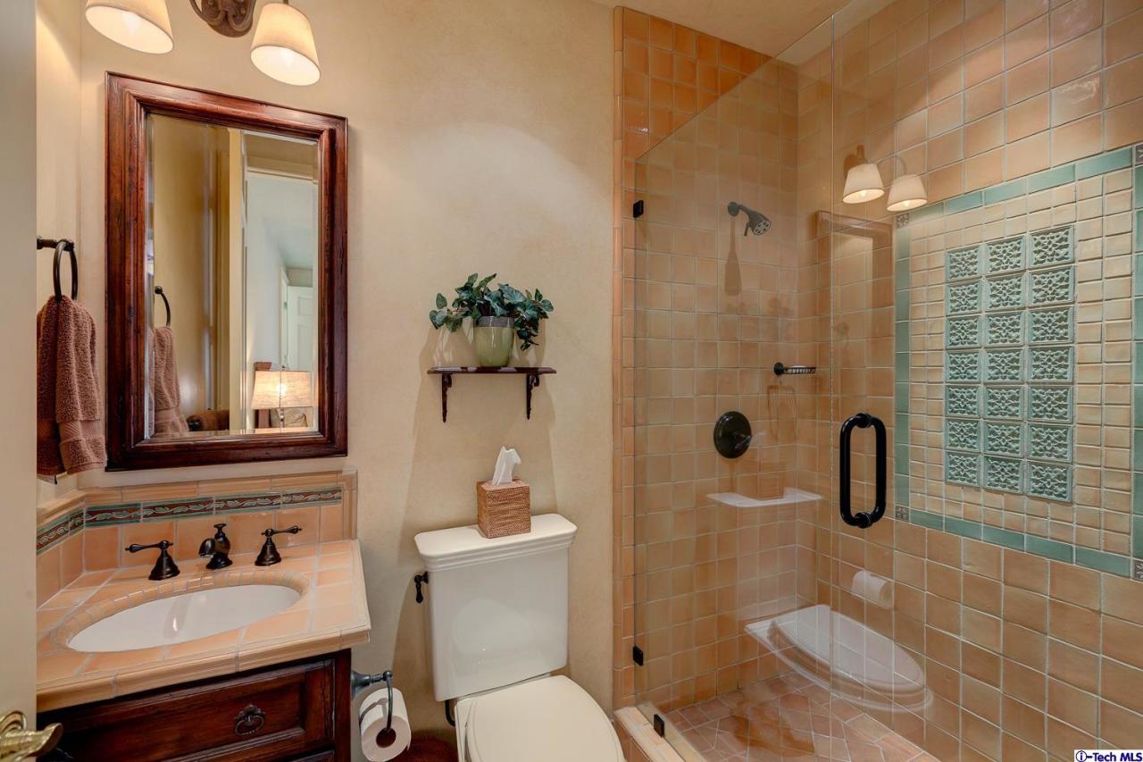 Undisclosed Address Pasadena, CA 91103 - Photo 35 of 80 a bathroom with a sink toilet and shower