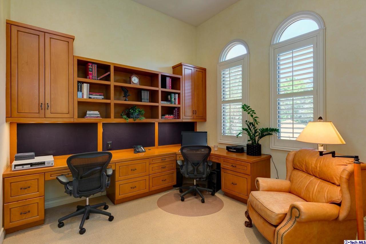 Undisclosed Address Pasadena, CA 91103 - Photo 37 of 80 a view of a workspace with furniture and a window