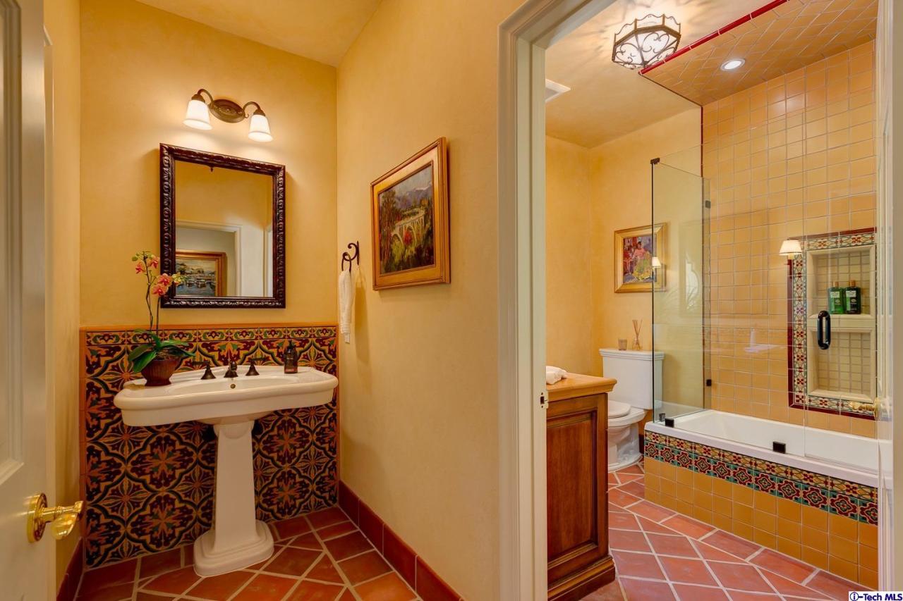 Undisclosed Address Pasadena, CA 91103 - Photo 52 of 80 a bathroom with a sink mirror and a bathtub