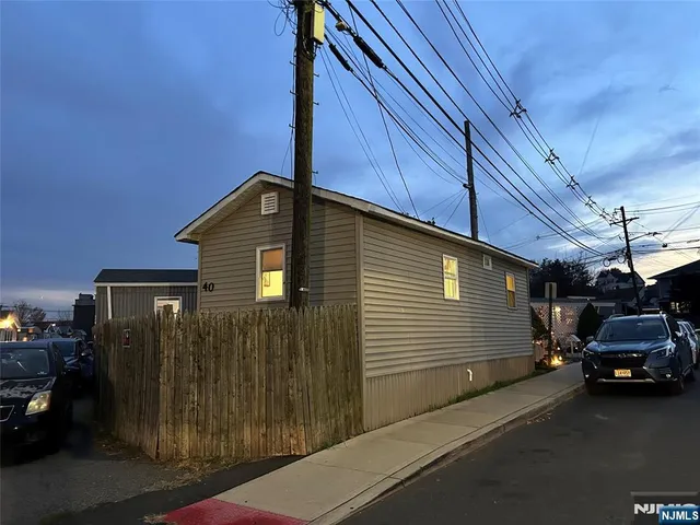 a car parked in front of a house