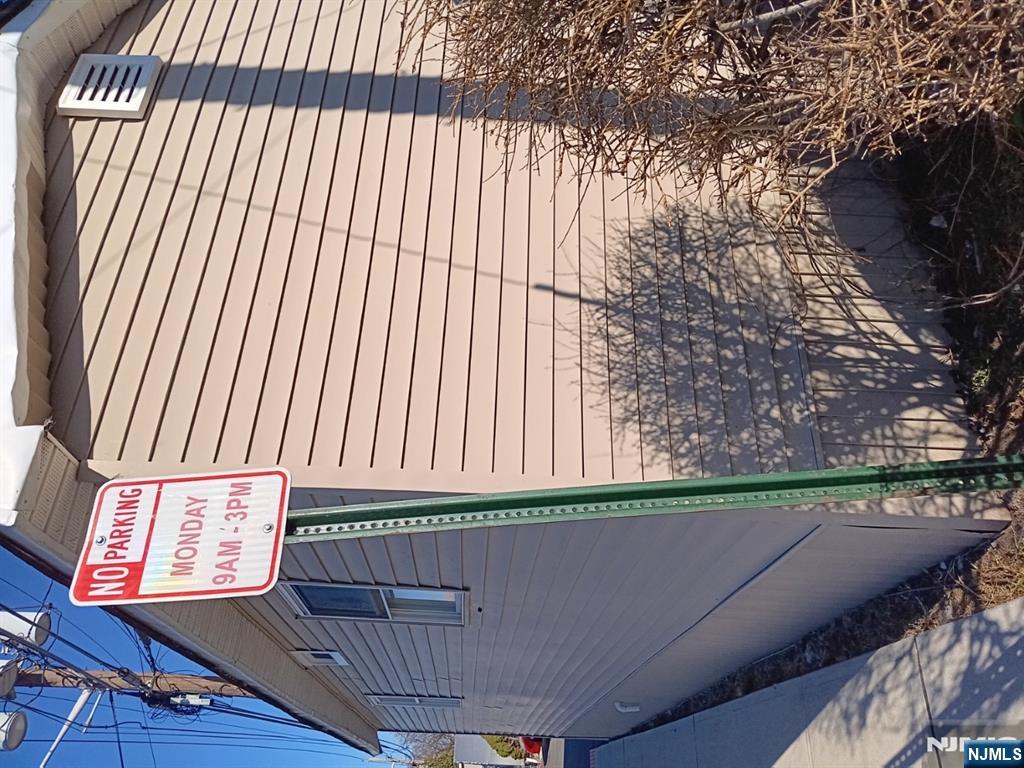 40 Poplar Street Lodi, NJ 07644 - Photo 13 of 16 a sign on a brick wall