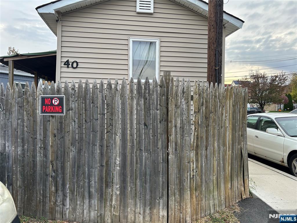 40 Poplar Street Lodi, NJ 07644 - Photo 15 of 16 a view of a wooden fence
