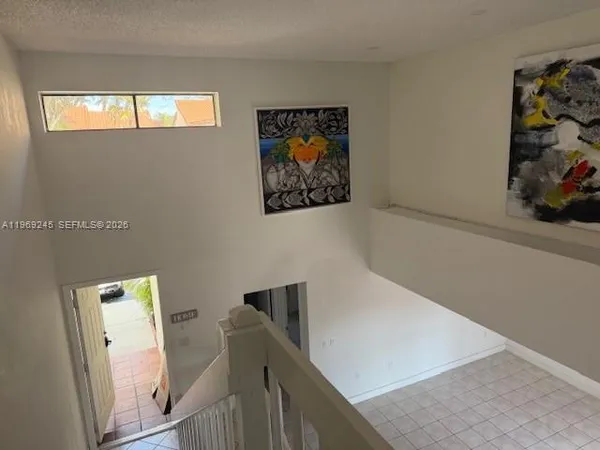 a view of a hallway with workspace