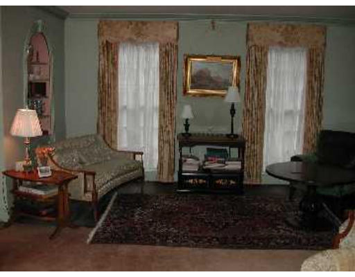 52 Clarke Circle Needham, MA 02492 - Photo 4 of 9 a living room with furniture