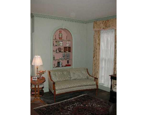 52 Clarke Circle Needham, MA 02492 - Photo 5 of 9 a living room with furniture and a rug