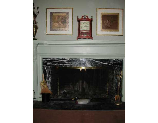 52 Clarke Circle Needham, MA 02492 - Photo 6 of 9 a stove top oven sitting inside of a kitchen