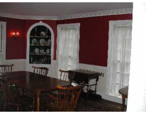 52 Clarke Circle Needham, MA 02492 - Photo 8 of 9 a table and chairs in a room
