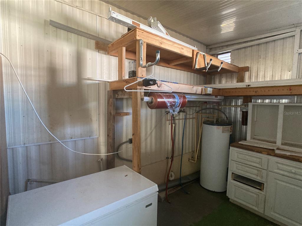 1710 7th Street Southwest, Unit 44 Ruskin, FL 33570 - Photo 30 of 34 a utility room with dryer and washer