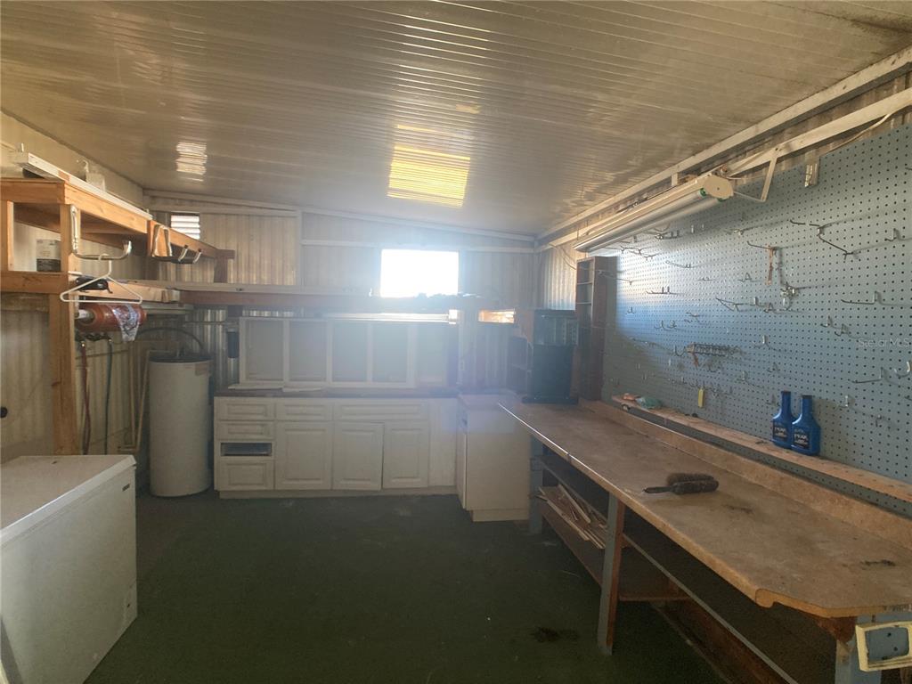 1710 7th Street Southwest, Unit 44 Ruskin, FL 33570 - Photo 31 of 34 a bathroom with a sink a toilet and shower