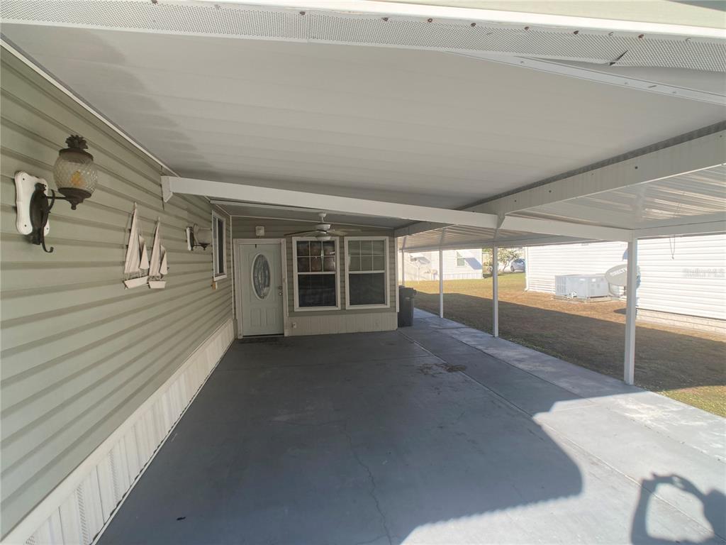 1710 7th Street Southwest, Unit 44 Ruskin, FL 33570 - Photo 6 of 34 a view of a porch
