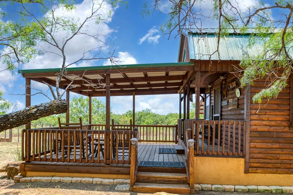 15055 County Road 306 Cisco, TX 76437 - Photo 7 of 40 a view of porch with a table and chairs