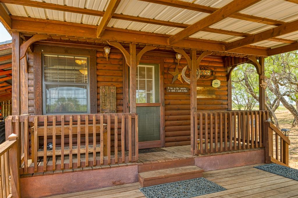 15055 County Road 306 Cisco, TX 76437 - Photo 8 of 40 a view of porch with a small cabin