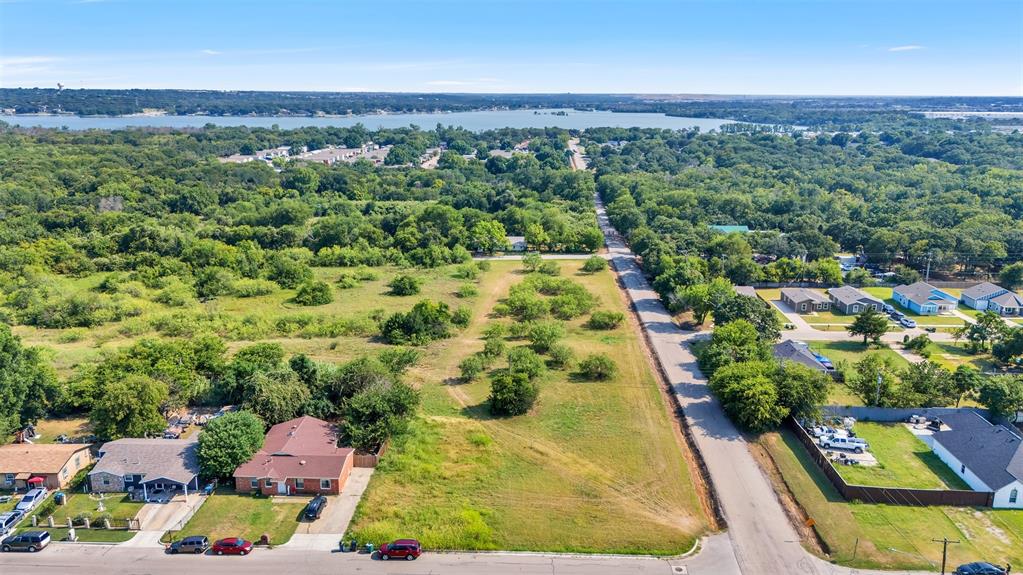 6004 Grayson Street Fort Worth, TX 76119 - Photo 6 of 13 an aerial view of residential houses with outdoor space