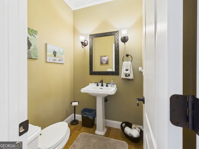 a living room with fireplace furniture and a flat screen tv