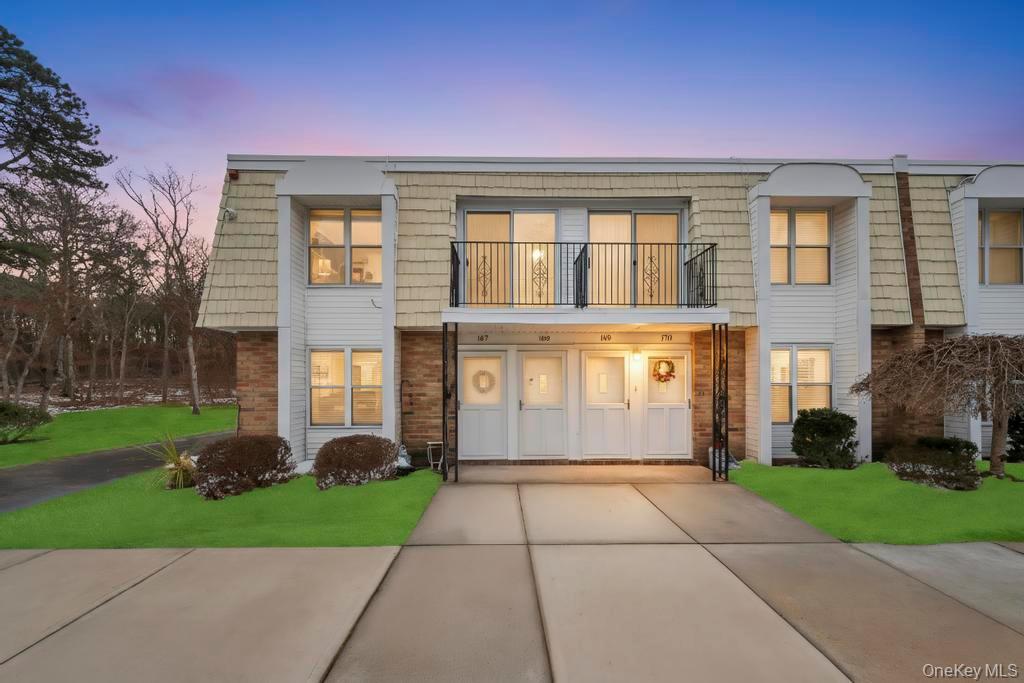85 Rocky Point Yaphank Road, Unit 168 Rocky Point, NY 11778 - Photo 1 of 32 a front view of a house with garden