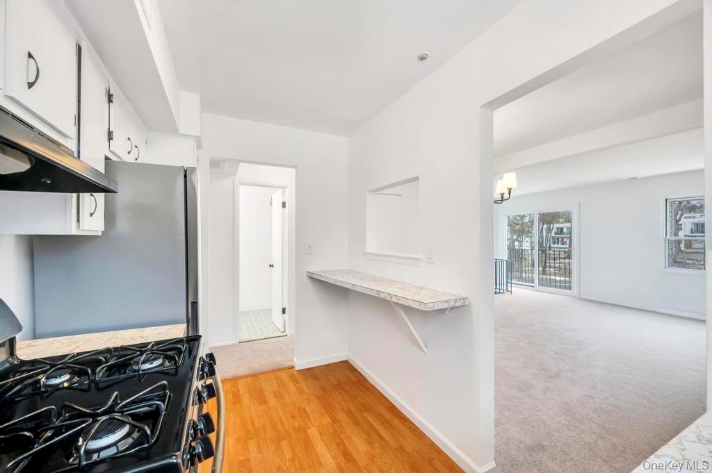 85 Rocky Point Yaphank Road, Unit 168 Rocky Point, NY 11778 - Photo 32 of 32 a bedroom with a bed and a window