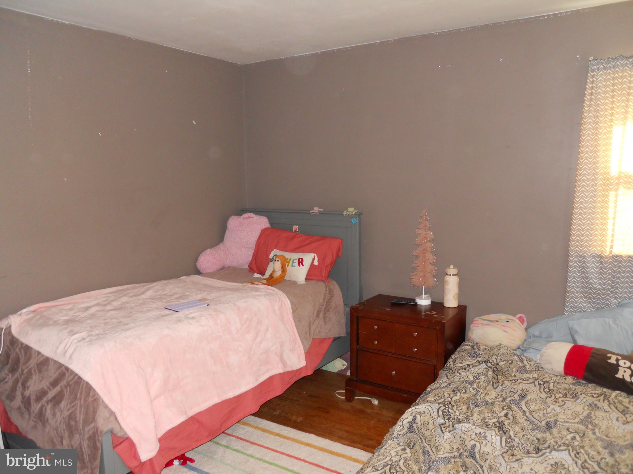 164 Oberlin Avenue Reading, PA 19608 - Photo 24 of 31 a bedroom with a bed and window