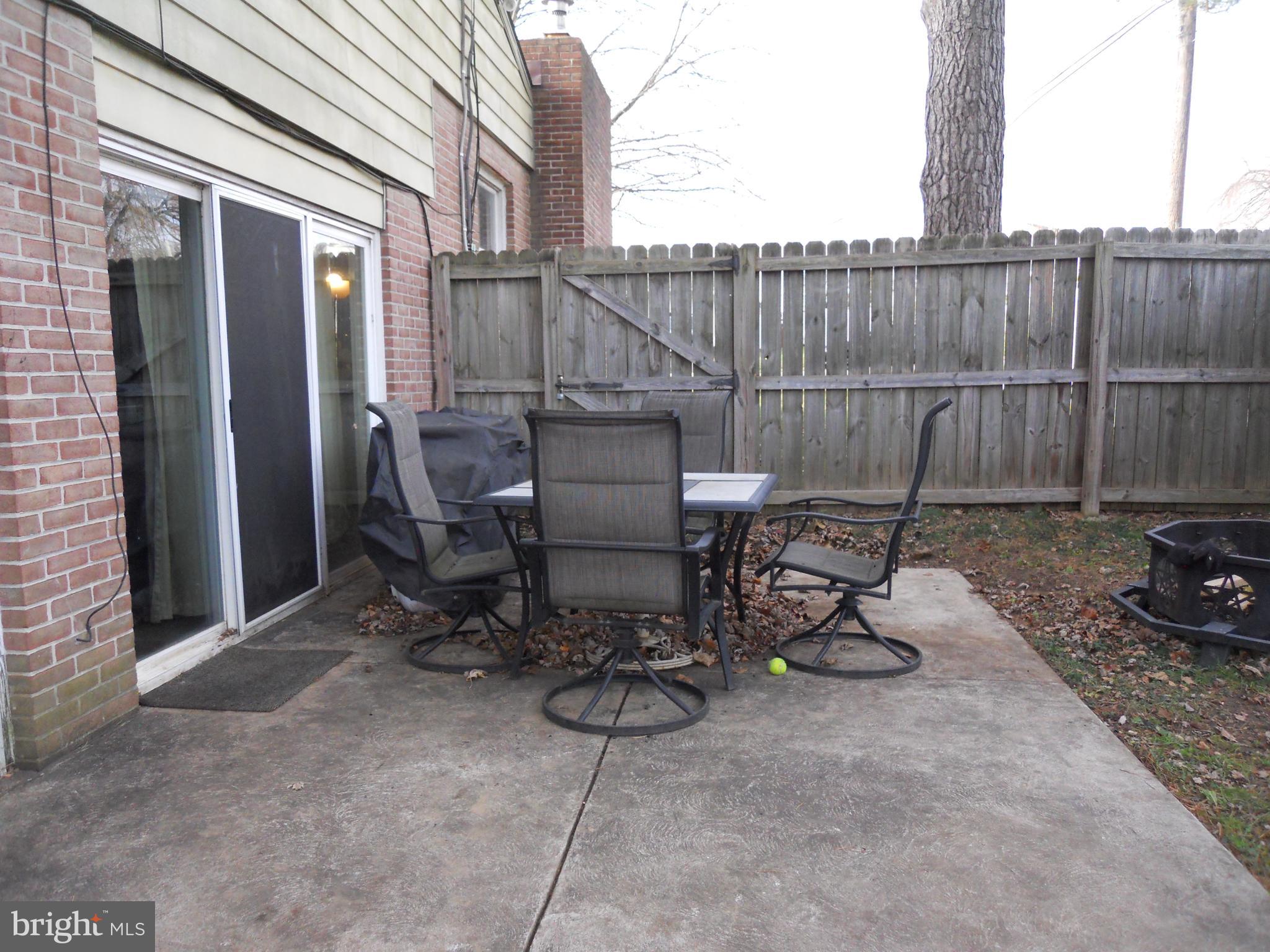 164 Oberlin Avenue Reading, PA 19608 - Photo 27 of 31 a view of a chairs and table in the backyard