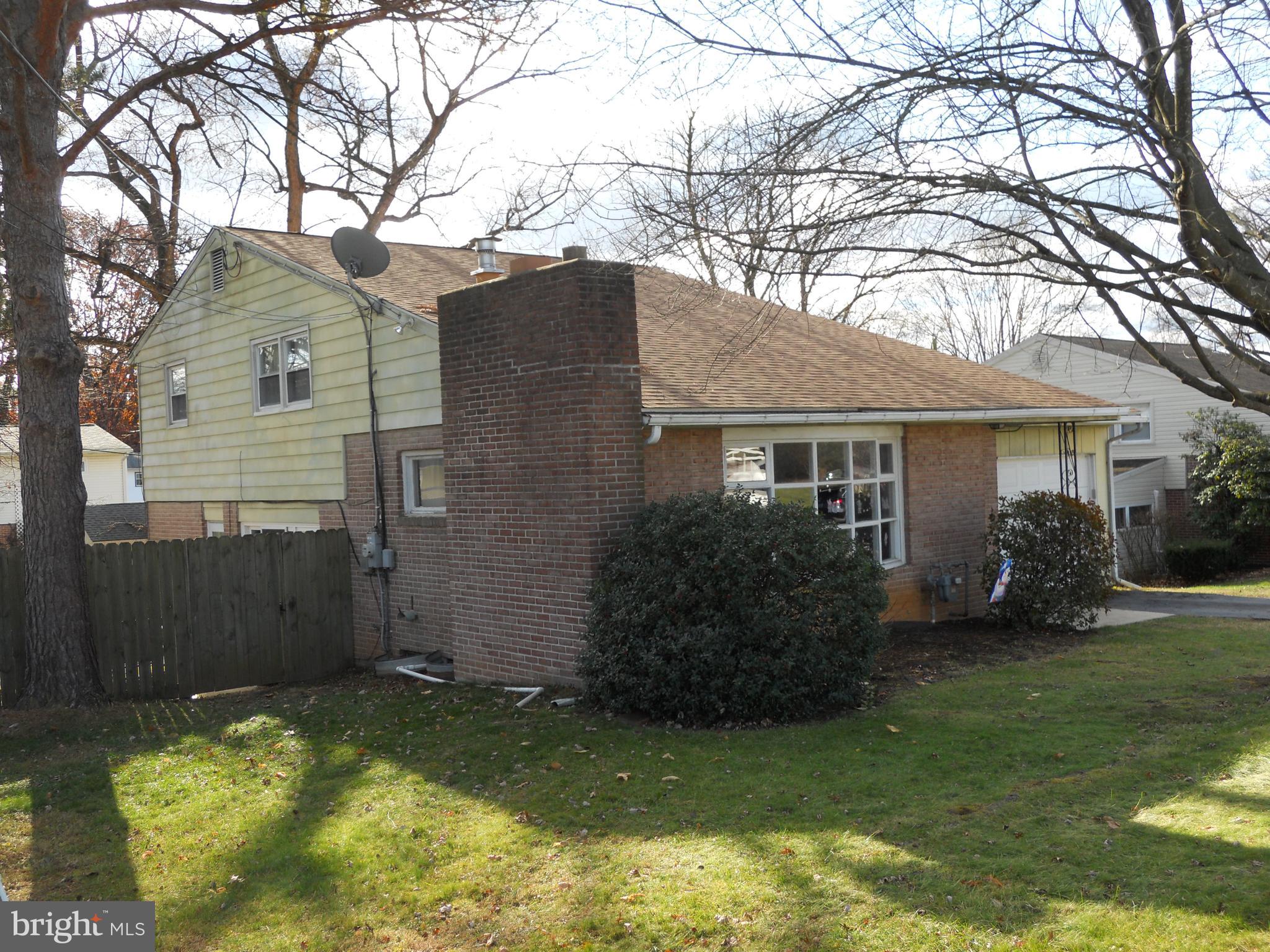 164 Oberlin Avenue Reading, PA 19608 - Photo 3 of 31 a backyard of a house with yard and outdoor seating