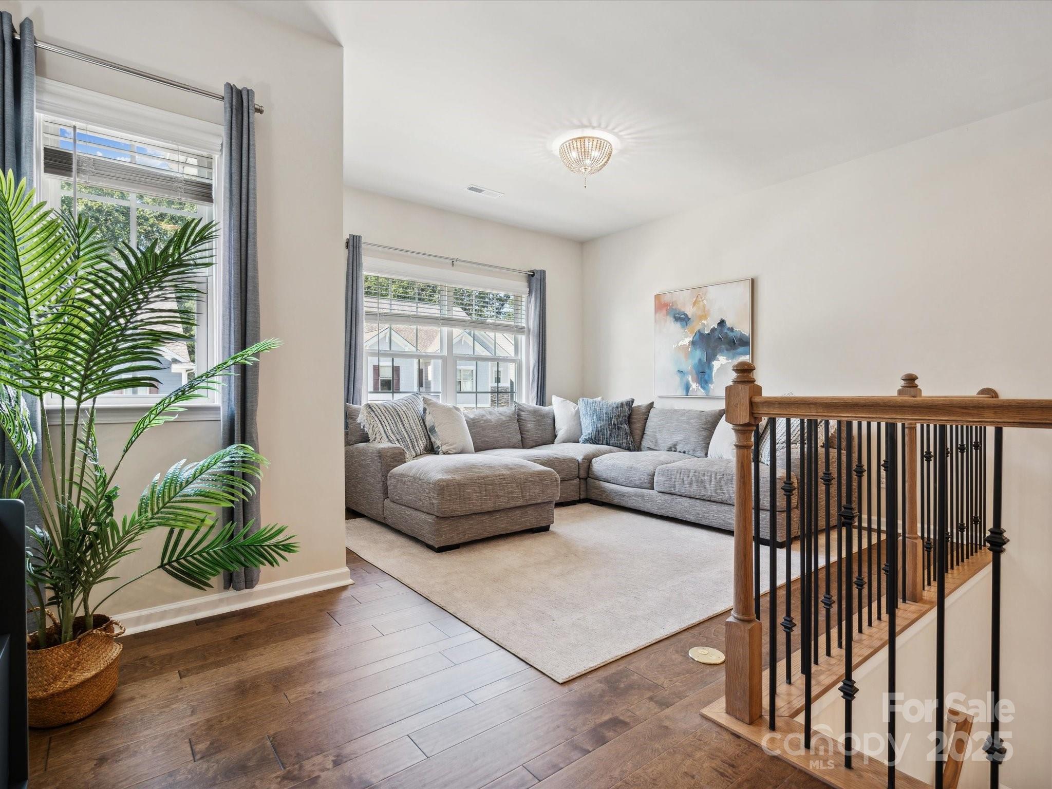 924 Stebbins Drive Fort Mill, SC 29715 - Photo 25 of 48 a living room with furniture and a potted plant