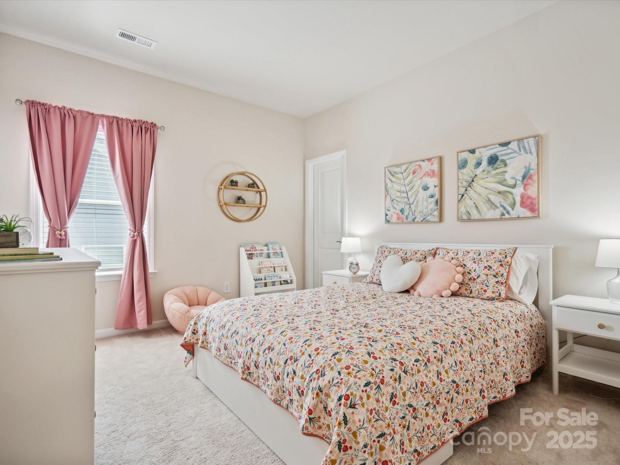 924 Stebbins Drive Fort Mill, SC 29715 - Photo 30 of 48 a bedroom with a large bed and a window