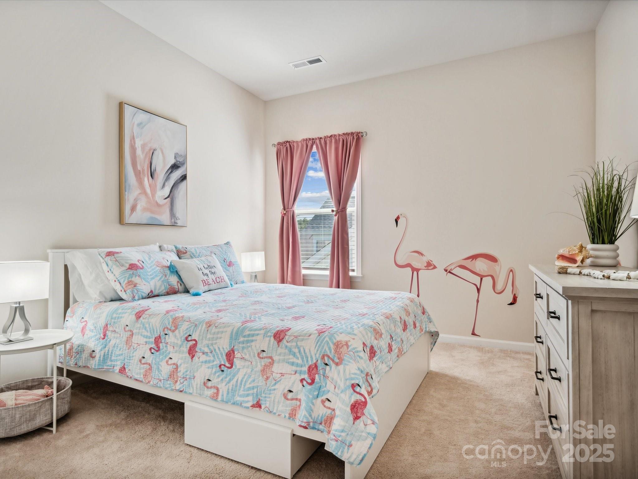 924 Stebbins Drive Fort Mill, SC 29715 - Photo 31 of 48 a bedroom with a bed and a couch