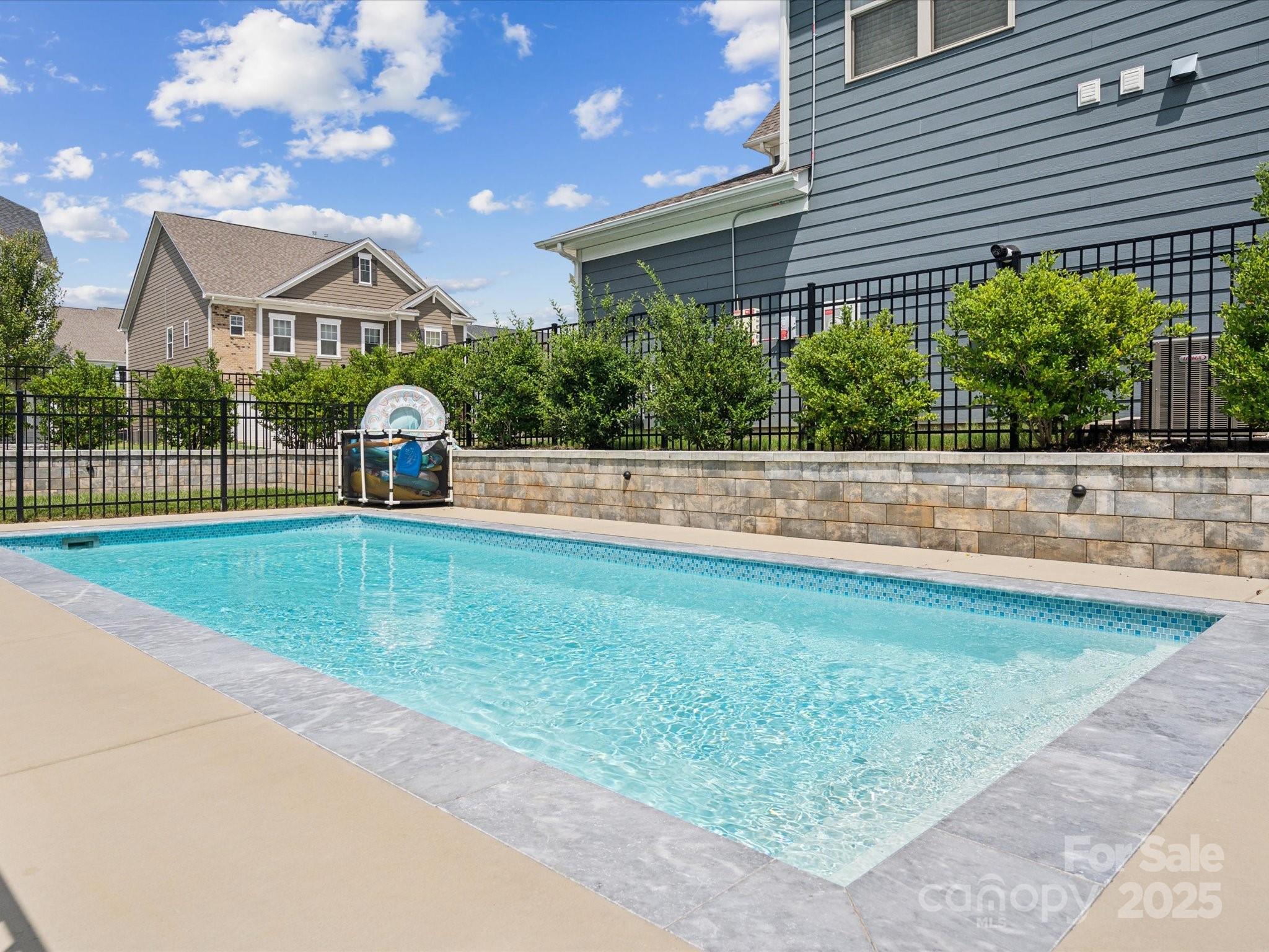 924 Stebbins Drive Fort Mill, SC 29715 - Photo 39 of 48 a view of a house with a backyard and a tree