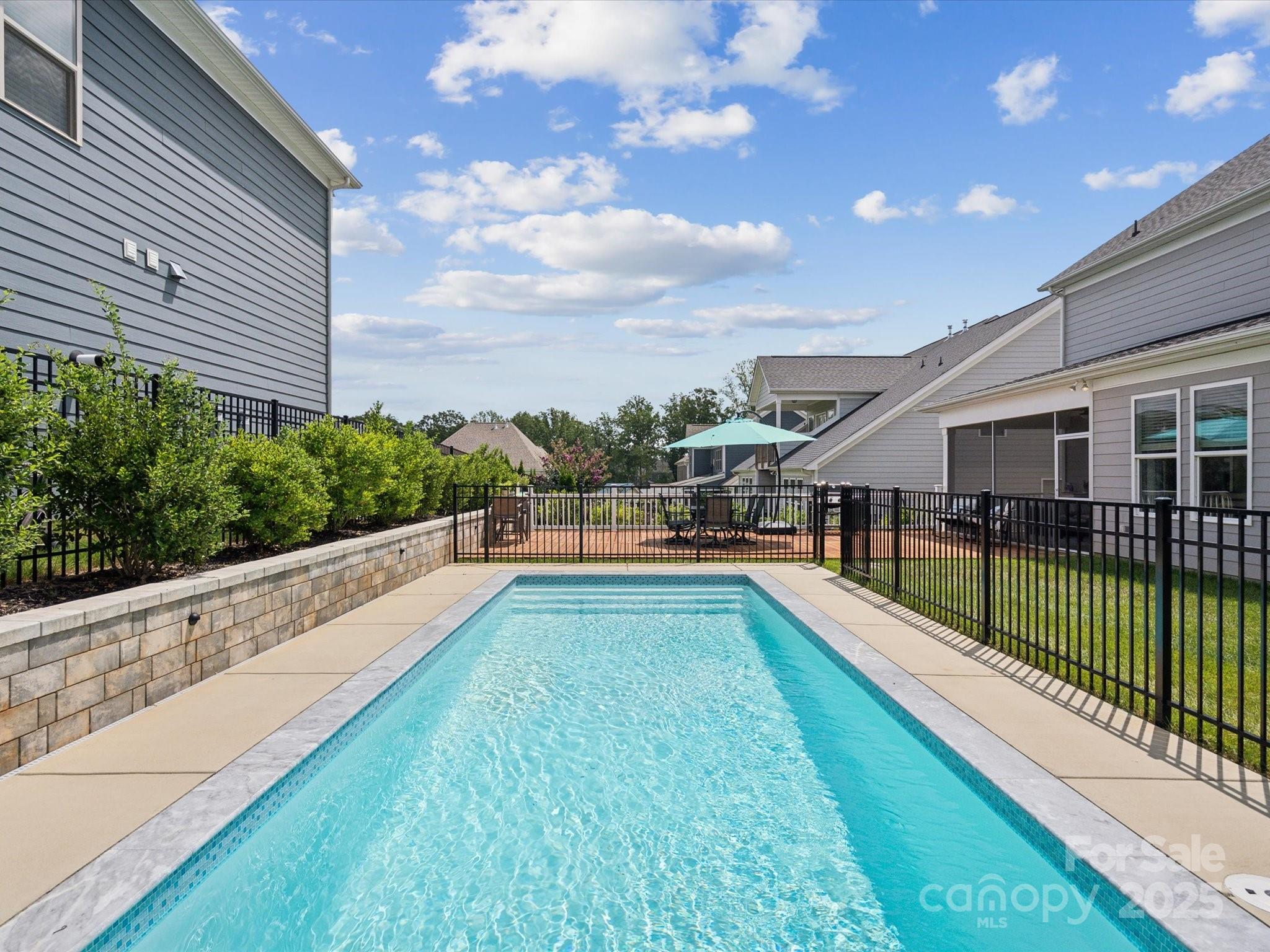 924 Stebbins Drive Fort Mill, SC 29715 - Photo 40 of 48 a view of a house with a swimming pool