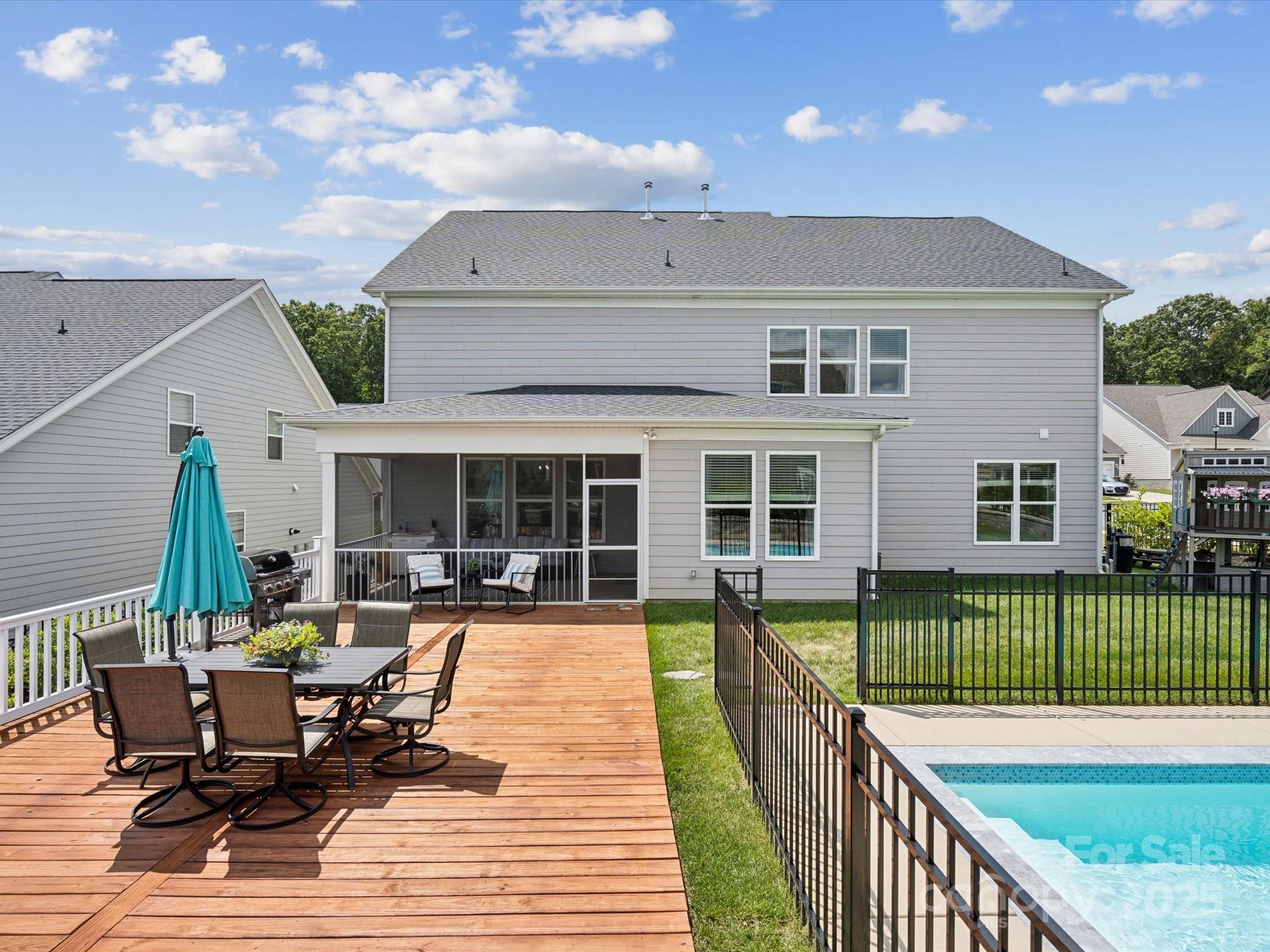 924 Stebbins Drive Fort Mill, SC 29715 - Photo 43 of 48 a view of a house with backyard and sitting area