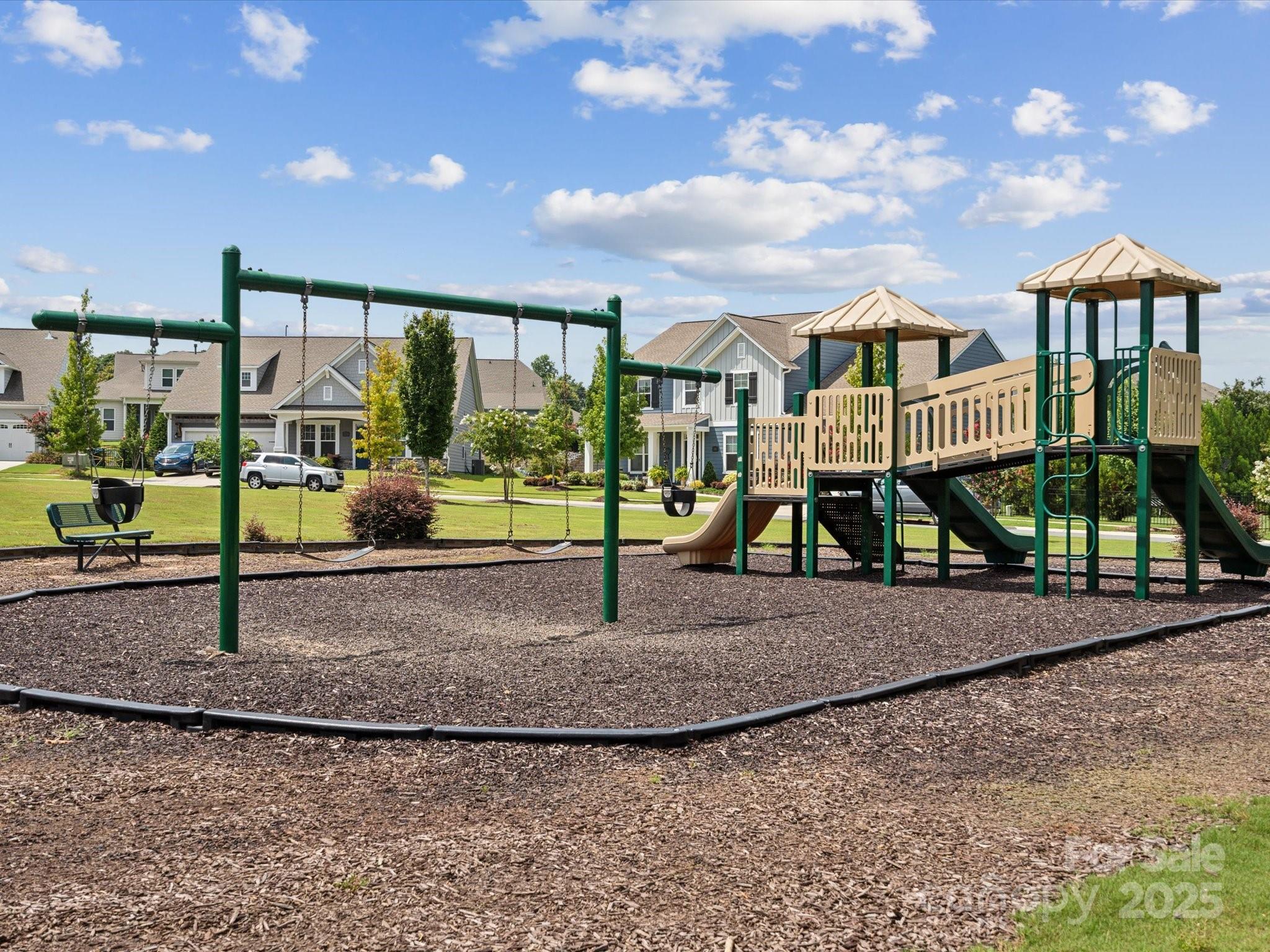 924 Stebbins Drive Fort Mill, SC 29715 - Photo 44 of 48 a view of a garden with a slide