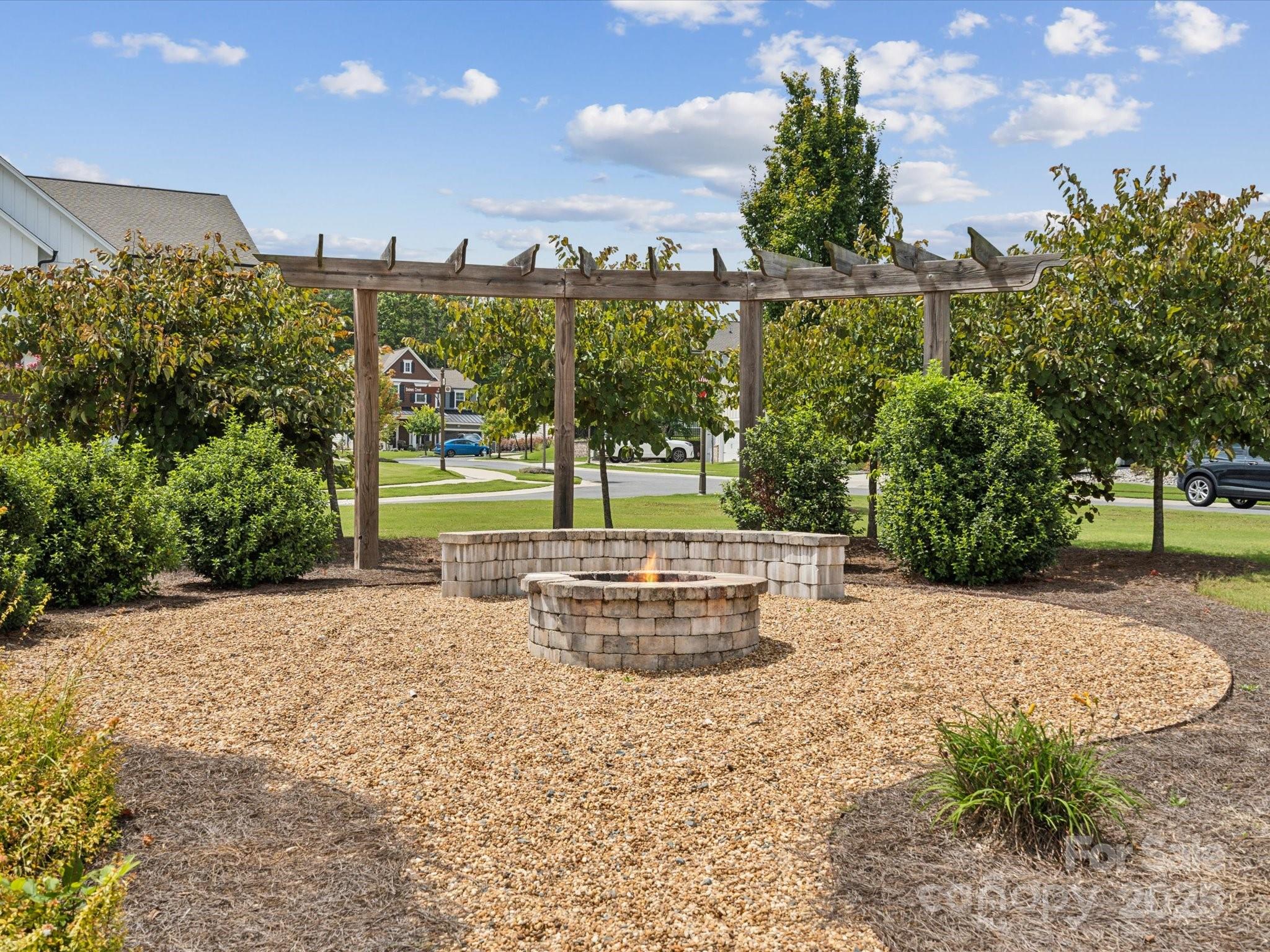 924 Stebbins Drive Fort Mill, SC 29715 - Photo 45 of 48 a view of a swimming pool with a patio and a yard