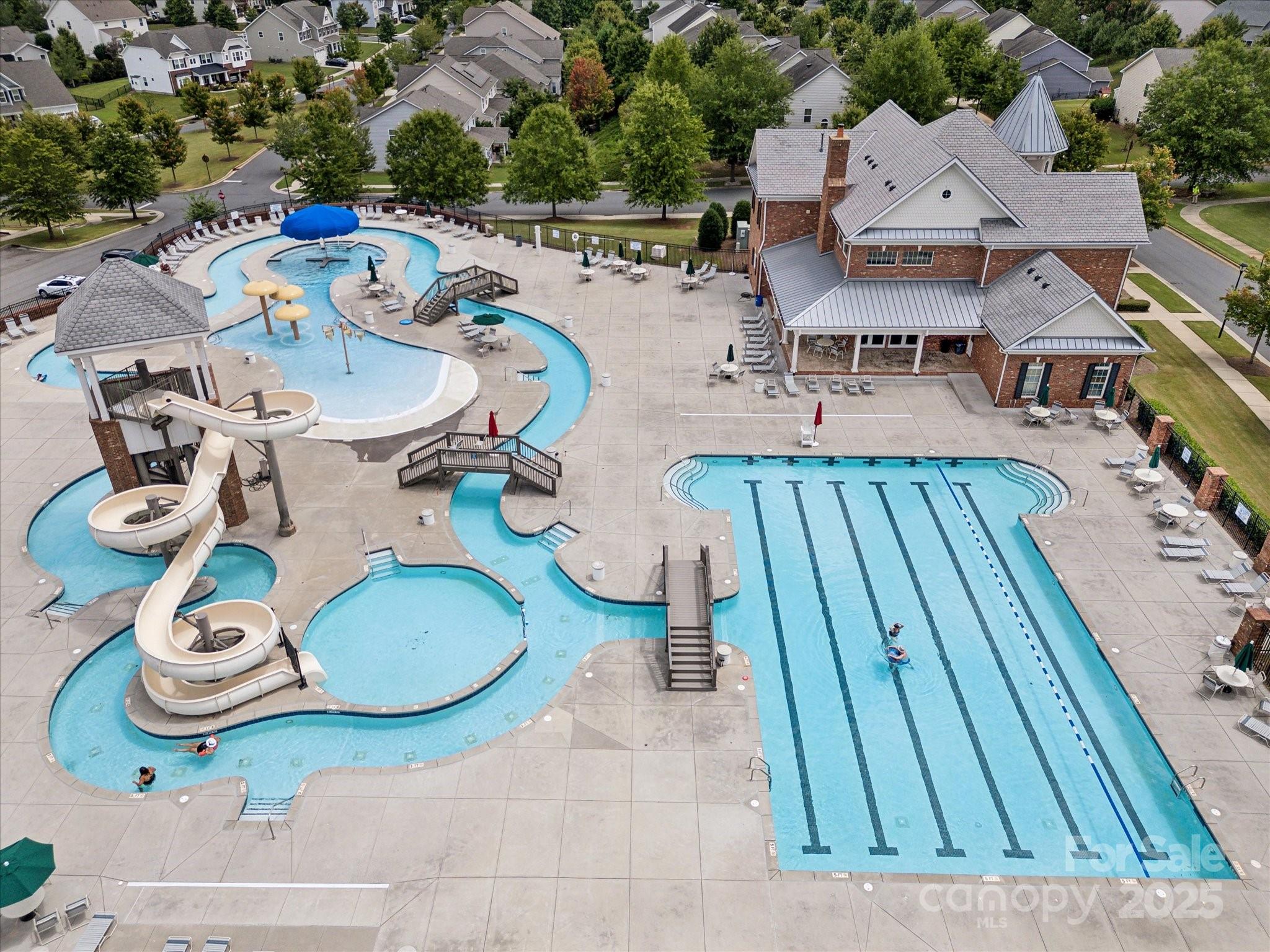 924 Stebbins Drive Fort Mill, SC 29715 - Photo 47 of 48 an aerial view of a house with table and chairs