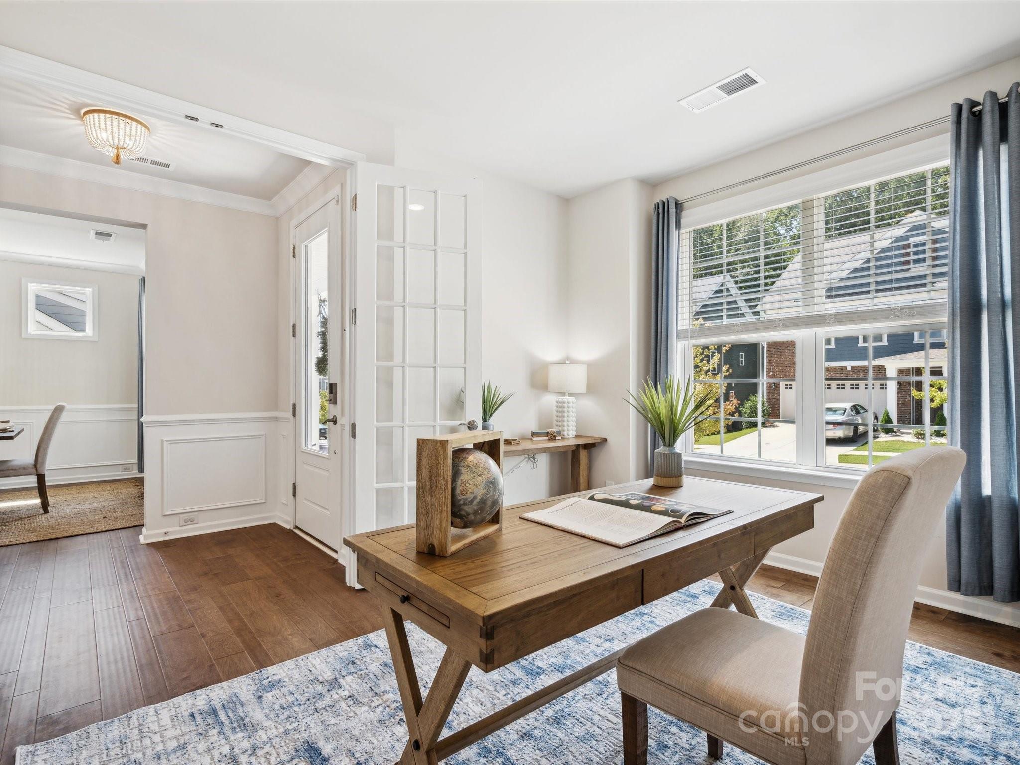 924 Stebbins Drive Fort Mill, SC 29715 - Photo 8 of 48 a living room with furniture and wooden floor