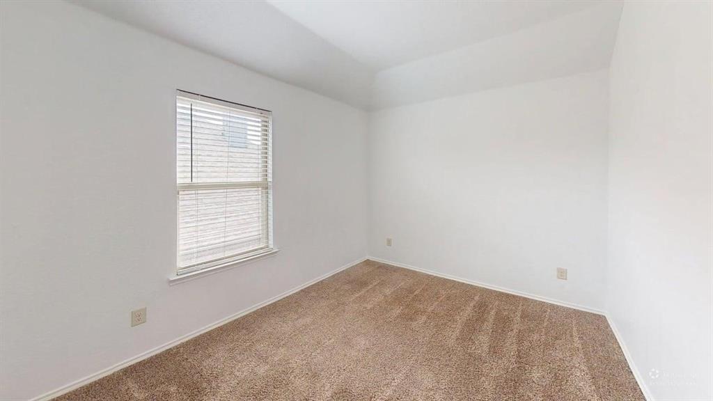 101 Rocky Pine Road McKinney, TX 75072 - Photo 32 of 39 an empty room with windows