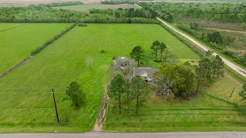 a view of a garden from a lake view