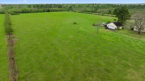 a view of a lake with a big yard