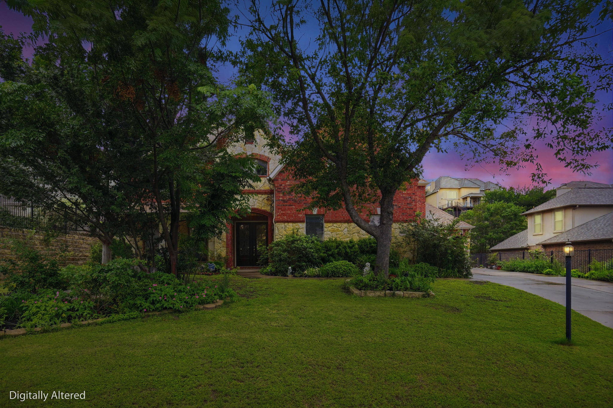 222 Vailco Lane Austin, TX 78738 - Photo 2 of 39 Two-story residence featuring a brick and stone facade