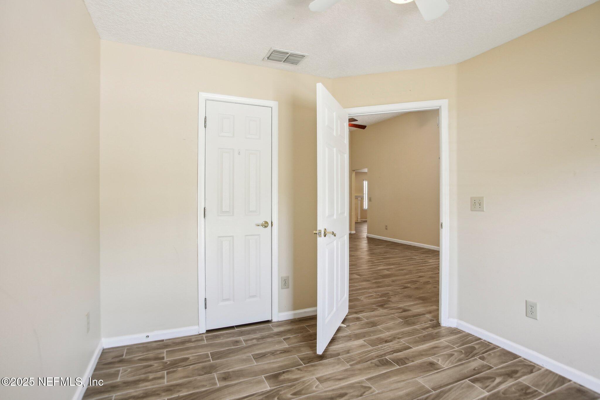 1634 Dockside Drive Fleming Island, FL 32003 - Photo 11 of 44 a view of a bathroom with wooden floor