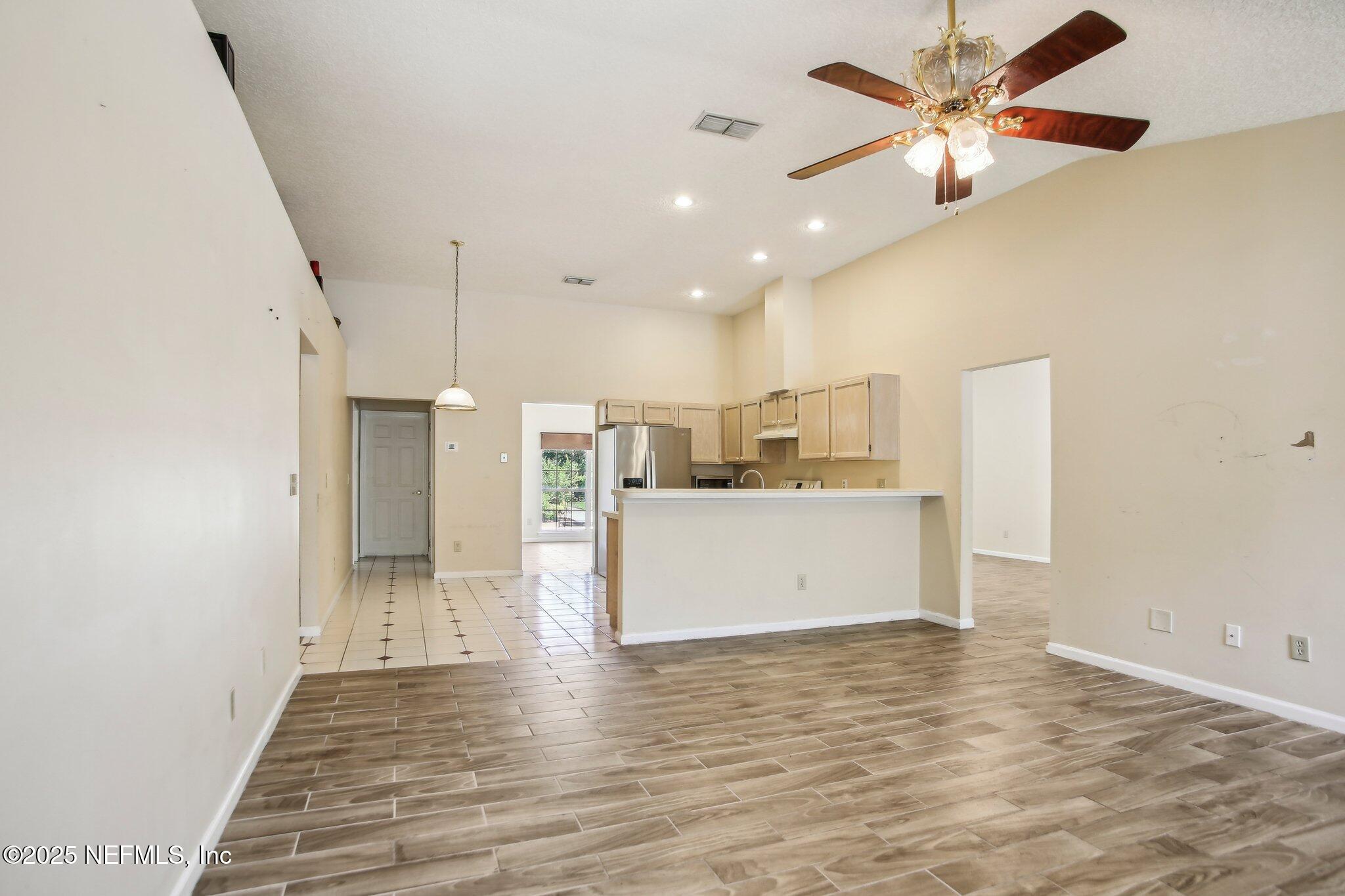 1634 Dockside Drive Fleming Island, FL 32003 - Photo 16 of 44 a view of kitchen and kitchen with microwave