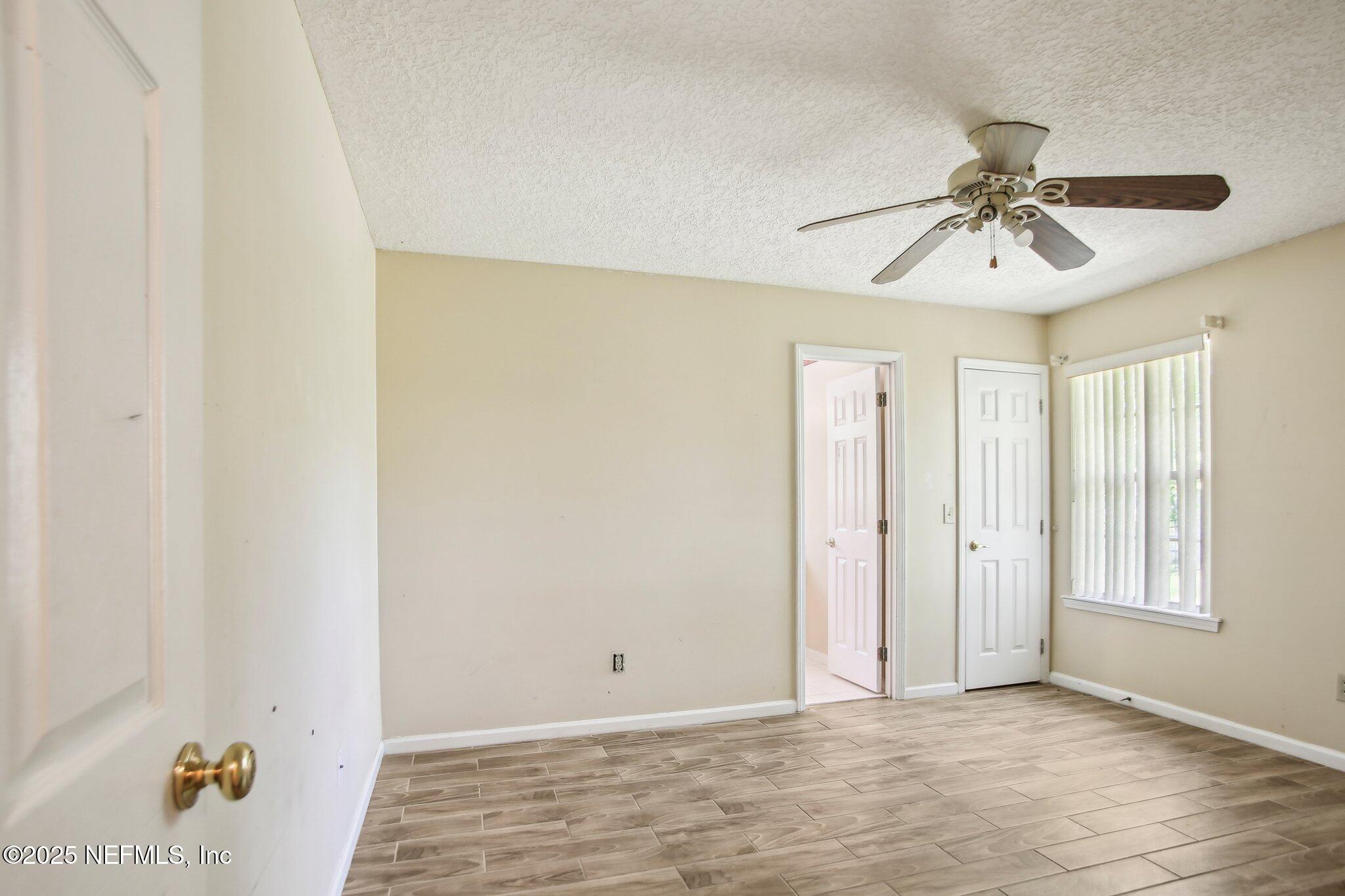 1634 Dockside Drive Fleming Island, FL 32003 - Photo 31 of 44 a view of a chandelier fan and entryway