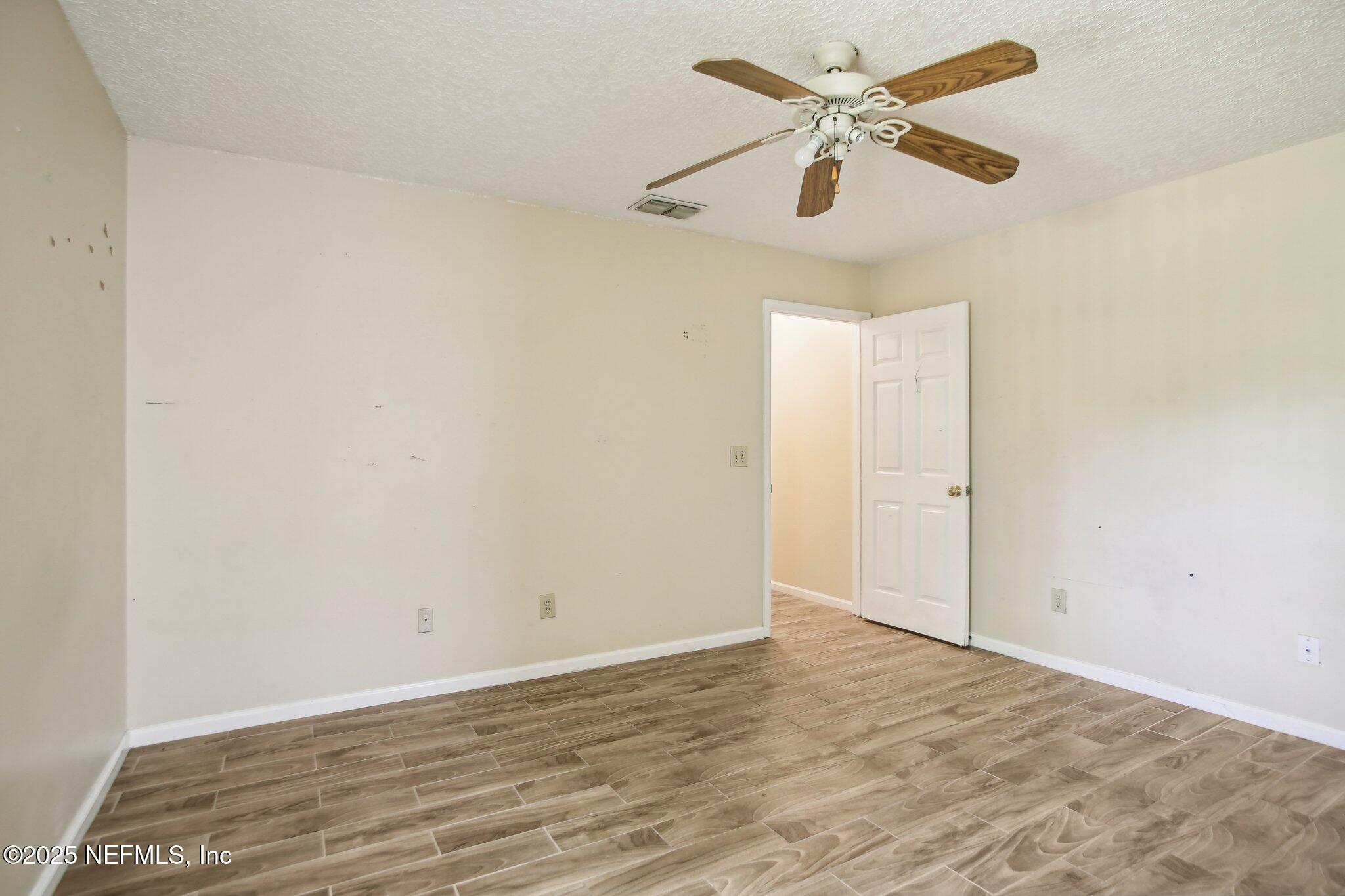 1634 Dockside Drive Fleming Island, FL 32003 - Photo 33 of 44 wooden floor in an empty room